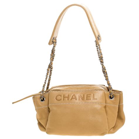 chanel beige lamb leather sac cordon shoulder bags|Chanel shopping bags.